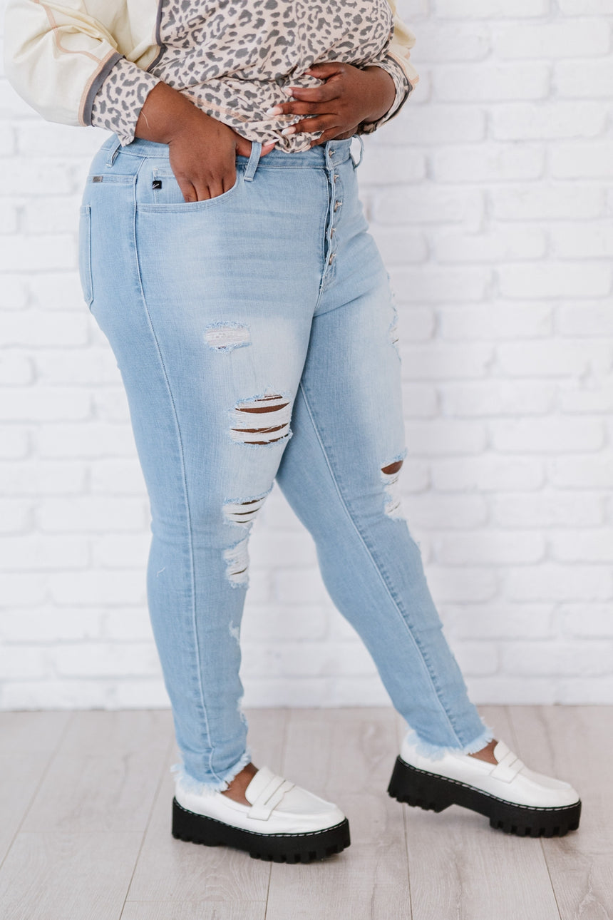 At Last Distressed Button Fly Skinny Jeans